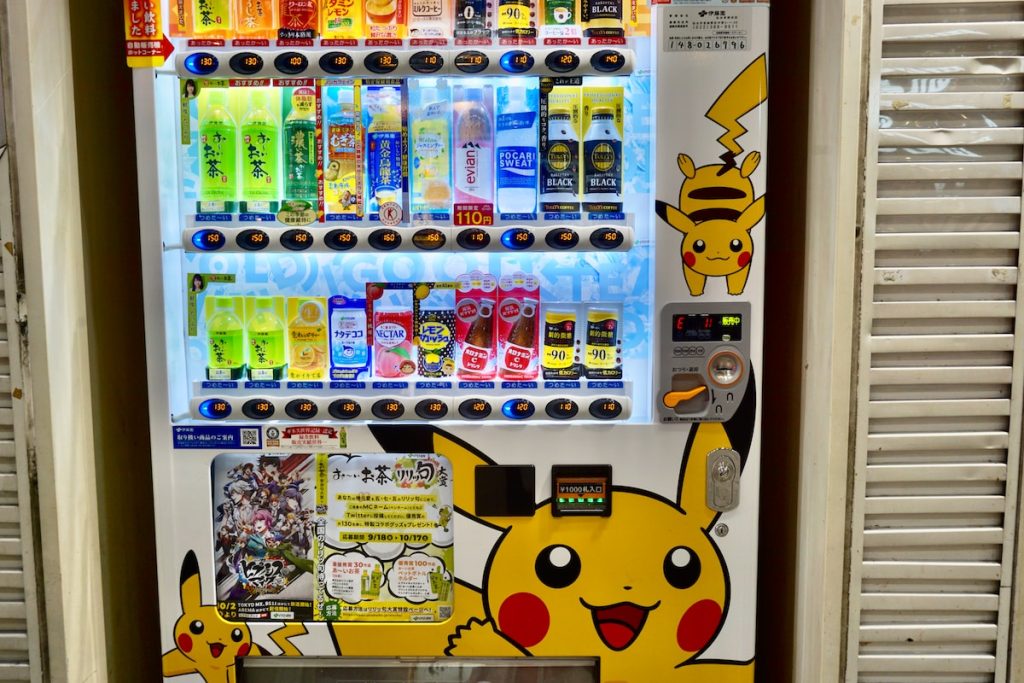 white and yellow vending machine